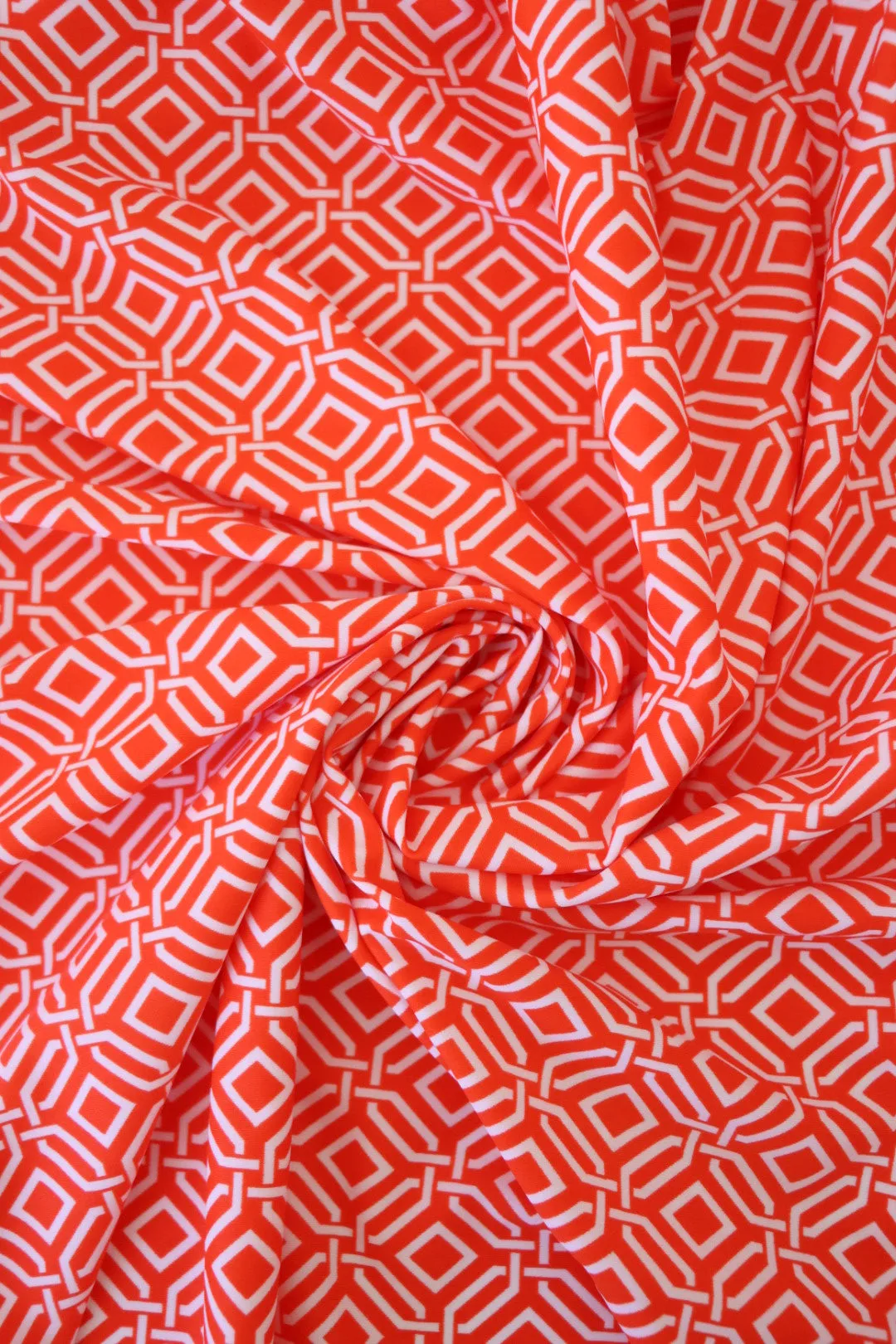 1YD PRECUT; Intertwined on Orange Nylon Spandex Tricot | Designer Deadstock